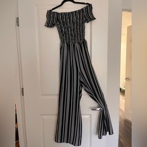 Off shoulder striped jumpsuit. L but fits like M.